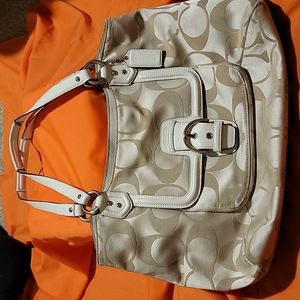 White and tan coach shoulder bag **sold**